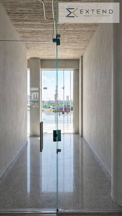 At the lowest price per meter in the heart of 6th of October on the central axis in a strategic location with a large daily visitor traffic, a shop for rent with an area of 30m suitable for various activities and a facade