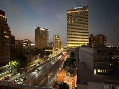 للايجار اول سكن تشطيب فندقي فيو رائع قرب فندق شيراتون للسكن الراقي والمميز بالدقي