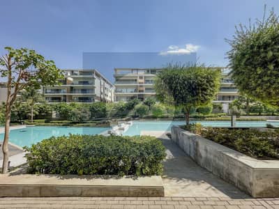 fully furnished apartment for sale 3bed  view pool & landscape in new cairo Prime location near AUC compound lake view