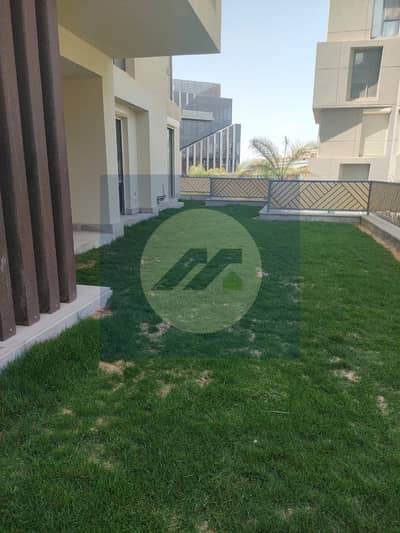 For Rent Semi-Furnished Ground Floor 3-Bedroom Apartment with Private Garden in Eastown Spectrum, New Cairo