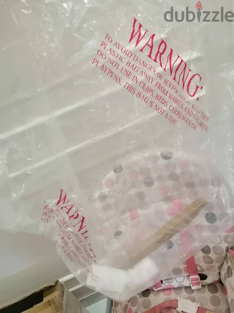 Petit Bebe pink feeding chair 2