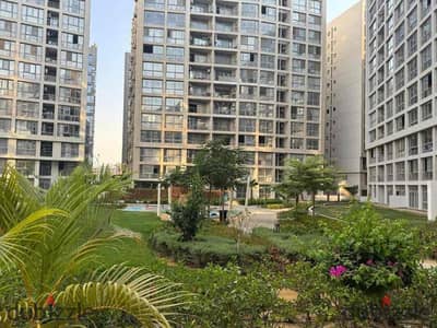 Studio for sale in Compound One Qatamiah 75 meters half finishing with an open view in a distinctive tower