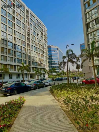 Apartment for sale in Compound One Qatami 231 meters semi-finished garden view in a distinguished tower