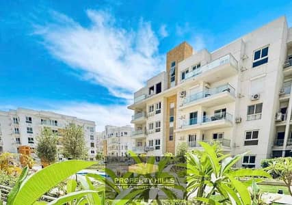 Own an apartment with Mountain View iCity October in the best location in Sheikh Zayed next to Grand Heights and minutes from Dahshour link