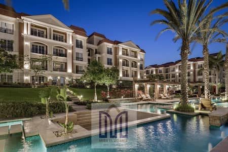 An apartment finished in the English heritage, overlooking lakes, with installments over 8 years with the lowest down payment in the heart of the Fifth Settlement next to the Sodic compound.