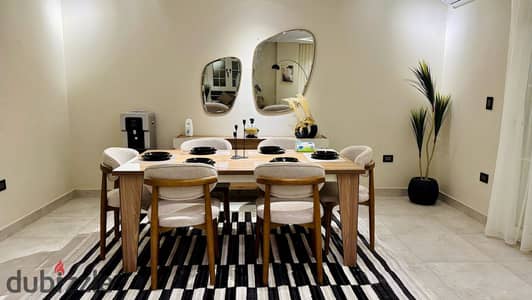 Apartment for hotel rent in the Seventh District, the most upscale district in Sheikh Zayed, suitable for all periods