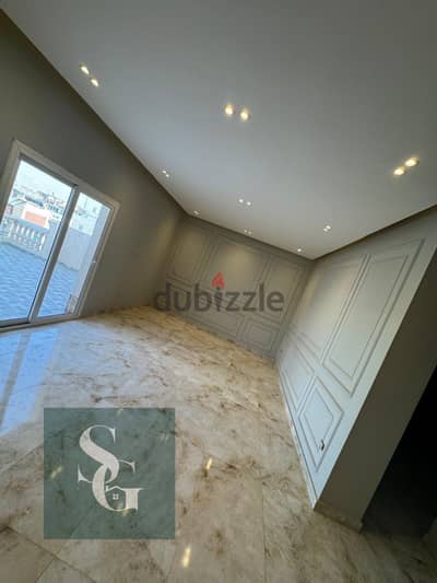 Spacious half roof apartment in Al Banafseg 4