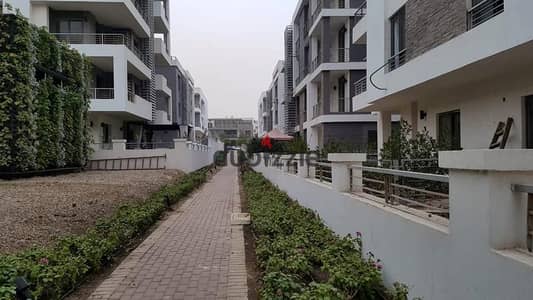Apartment with garden for sale at the old price in one of Egypt's most prestigious compounds, opposite Cairo Airport + installments available