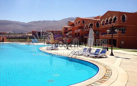 Fully furnished chalet for sale in Bahamas Phase – Porto Sokhna with an open sea view in a quiet and prime location inside the resort.