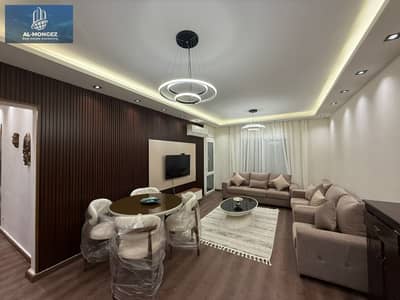 Apartment for rent, 136 square meters, brand new, high-end finishes, modern furnishings, open view, in Al Rehab, First Settlement, New Cairo