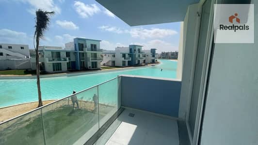 LAXURY TWIN CHALET FOR SALE 125 m ( overlooking the lagoon from every room ) READY TO MOVE AT FOUKA BAY