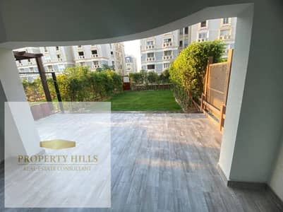 Ground floor apartment with a garden for sale at half its original price, ready for delivery and immediate inspection upon contracting, by Mountain View iCity