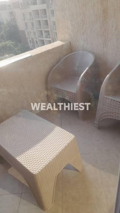 First row club facing apartment with wide garden view special finishing and furnished comfort in prime B7 location at superb rent