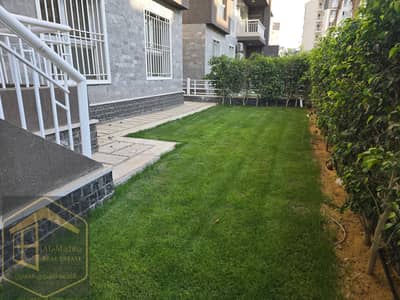 For sale, a ground apartment in Garden for sale in B14 Madinaty - old reservation with simple down payment