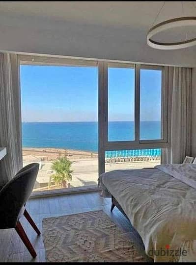 Hotel chalet for sale with a direct sea view, fully furnished and equipped, in Fouka Bay, North Coast