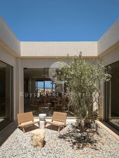 Own a twin house at a bargain price in Beit Al-Bahr and enjoy spacious living and complete privacy in one of the most prestigious coastal destinations
