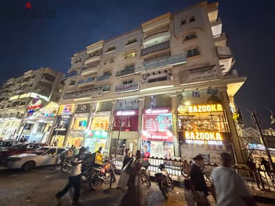 Commercial store for sale, 50 square meters, directly in front of Al-Hosari Mosque, rented for 60,000