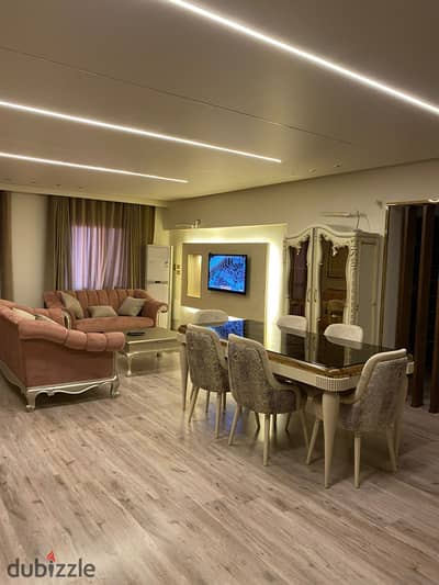 Furnished apartment for rent, 162 sq m, 3 bedrooms, ultra-super deluxe finishing and modern furnishings, in Al Rehab 2. The apartment faces north.