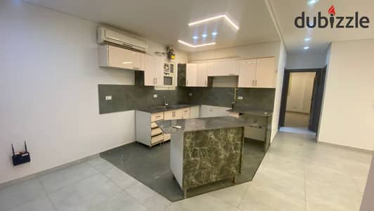 Exclusive apartment with kitchen and air conditioning inside a compound on the ground floor with a garden that has a swimming pool