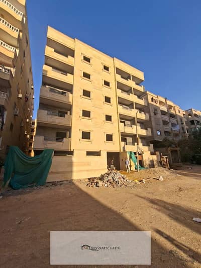 Apartment for sale in a prime location in the Gardens of the Pyramids - Area (A) - Red Brick