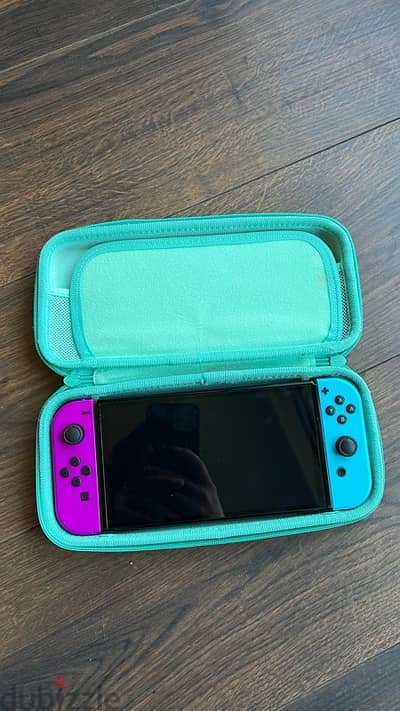 Nintendo Switch OLED and 6 games