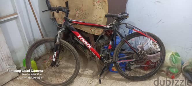 عجله Trinx M136H