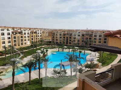 Apartment for sale in Stone Residence Compound ready to move with a 25% cash discount in Fifth Settlement with a landscape view in new cairo