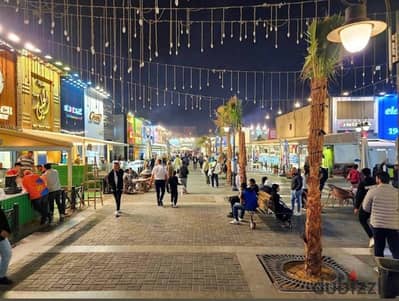محل للإيجار 90م + 45م أوت دور بالسوق التجاري القديم بالرحاب | مطعم  جاهز 