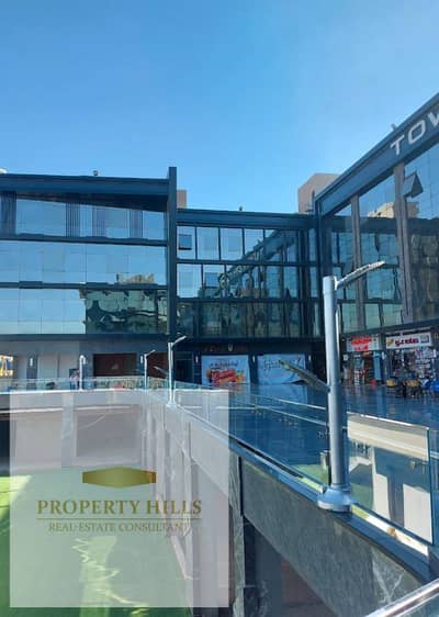 Shop for sale, rent 120,000 EGP per month, ground floor in an operating mall