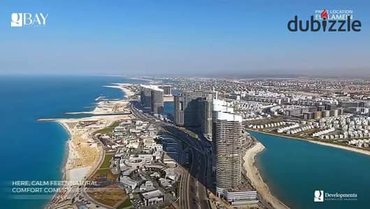 شالية للبيع متشطب بالكامل كيو باي – الساحل الشمالي اطلالة مميزة على البحر وبالتقسيط لمدة 8 سنوات