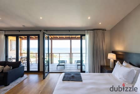 Stunning panoramic view, a chalet opportunity, finished in high luxury, at a price that will not be repeated, with a special discount for a limited time, directly on the sea in Ain Sokhna.