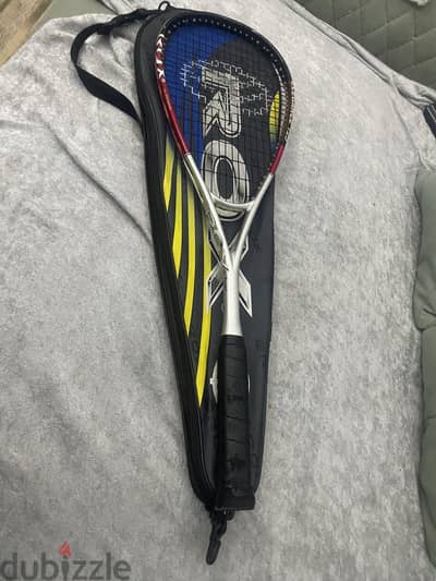 Rox Elegance 125g squash racket features a red and silver frame.