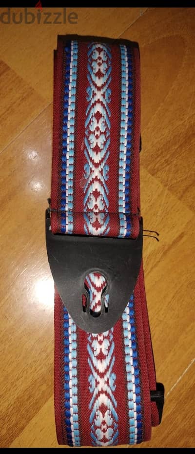 حزام جيتار.  Guitar Strap