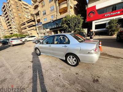 لانسر بومة 2006 للبيع حالة رائعة