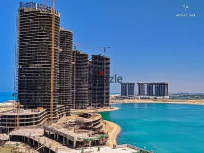 Receive immediately a fully finished two-bedroom apartment with VIP hotel-style finishing and a double view in Alamein Towers directly on the sea