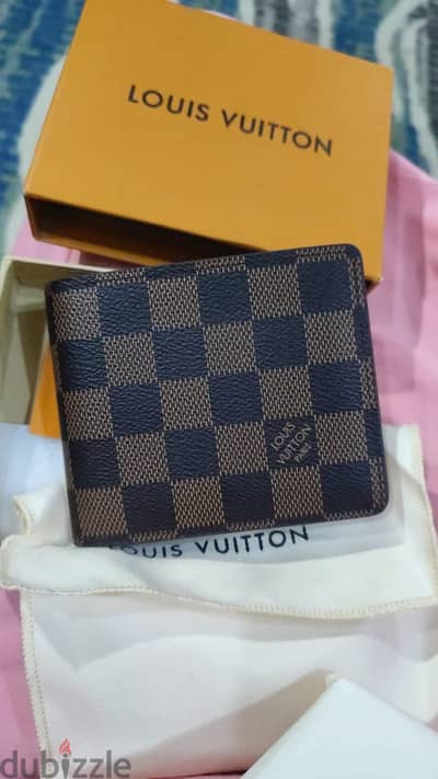 محفظه LOUIS VUTTON اصليه