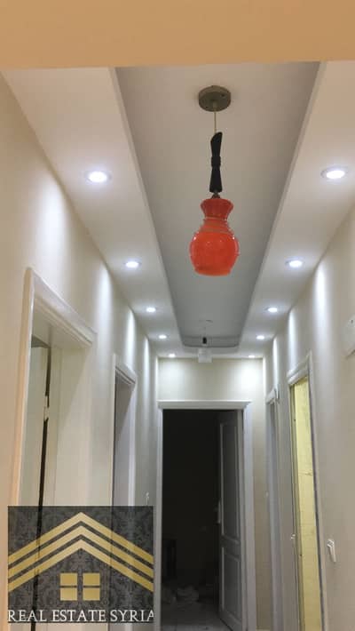 The apartment is 90 meters on Gamal Abdel Nasser axis, finished with gypsum board and all plumbing and paints changed. Super Lux finishing, a rare find on a high ground floor.