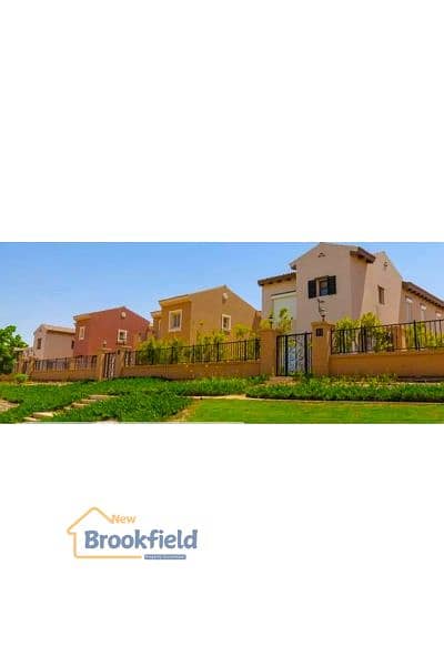 توين هاوس للبيع فى كمبوند ميفيدا بالمطبخ والتكييفات فيو مميز جداا Twin House for Sale in Mivida Compound | Kitchen & ACs Included | Very Prime View