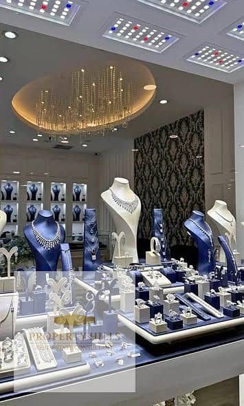 فرصه ذهبيه (( 180.000 الف جنيه بعائد ايجاري ))  لاكبر مول في قلب التجمع الخامس
