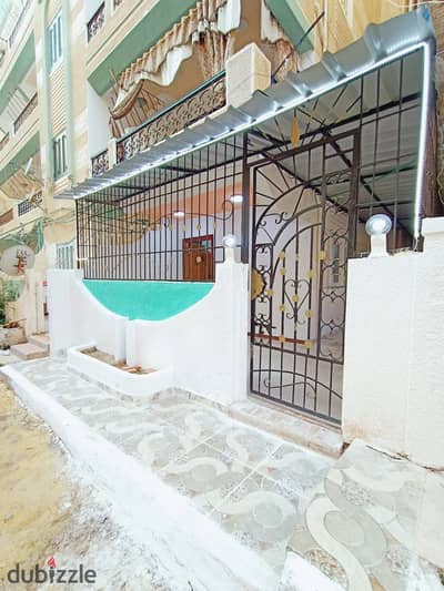 Ground floor apartment with a private entrance for sale in Alexandria, Al-Nakheel Beach, minutes to the sea and markets, fully registered with all amenities, suitable for living and good investment.