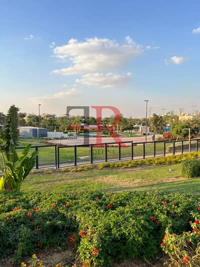 شقة للإيجار مفروشة بالكامل بإطلالة على الحديقة في سوديك فيليت القاهرة الجديدة.