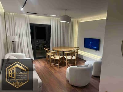 Luxury hotel apartment in Madinaty B15 at an excellent price, Ultra Super Lux finishing, first occupancy, open view