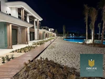 3-bedroom chalet, ready for immediate occupancy, fully finished with air conditioning, in Sodic John Ras El Hekma, close to the sea, with a lagoon vie