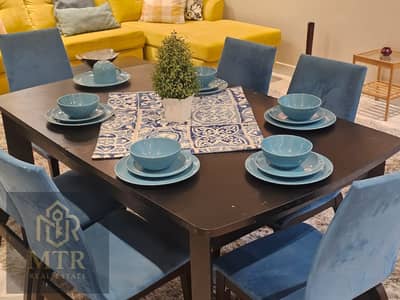 Furnished apartment for rent in Al Rehab, in a prime location next to the Old Market.