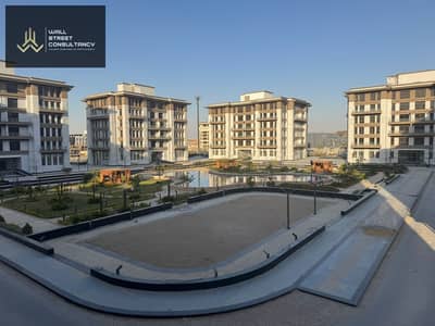 Fully finished apartment for sale — immediate handover — facing the American University on El Teseen Street, in the heart of Fifth Settlement