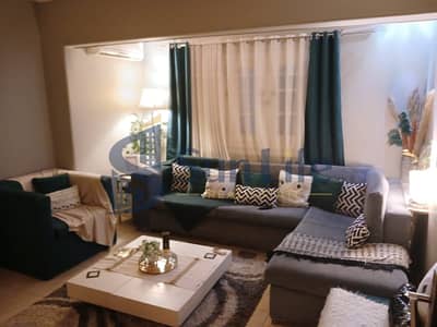  Apartment for rent in Al Ferdous Compound, Investment Area, on Abu Bakr Al-Siddiq Main Street, near Zewail Road, opposite Dreamland, Hadayek Octobe