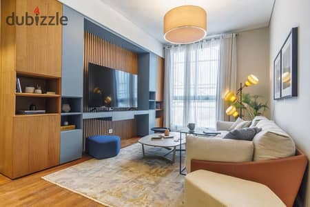 A great apartment for sale in Aeon Tower, fully finished, with a very special view, next to Mall of Arabia and Arkan.