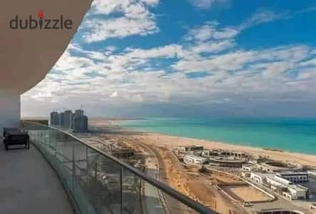 For sale, VIP chalet with a direct sea view, fully finished, ready for immediate delivery, in Mazarine Compound in New Alamein