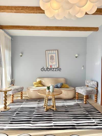 Furnished apartment for rent in Mivida compound hotel-style furnishings