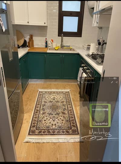 For rent, an apartment of 200m with kitchen in the best October compounds, Green Compound 5, very high-end finishing